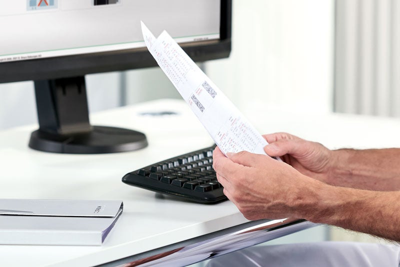 Compounding pharmacist transcribing nutrition regimen