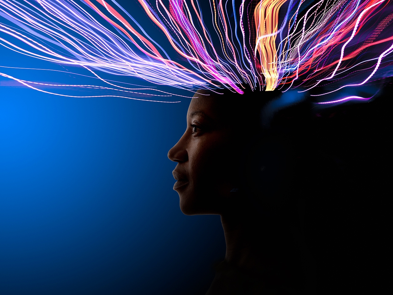 Light trails coming from African American's head