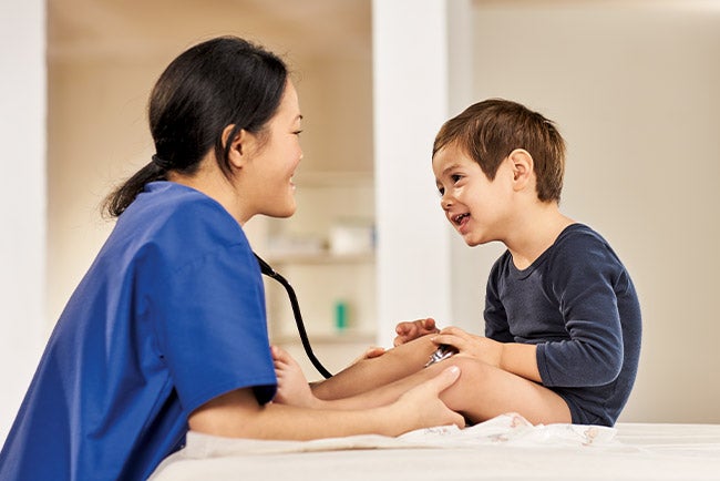 Doctor and patient boy on the pediatrics ward