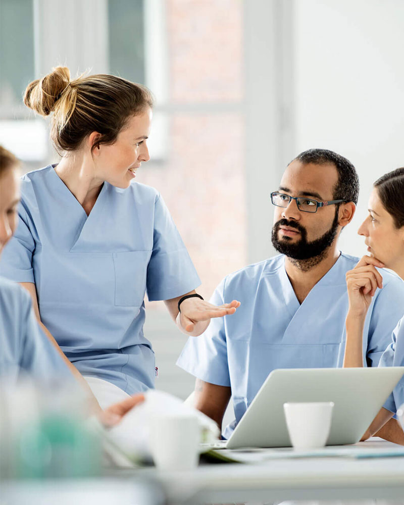 Healthcare workers exchange views