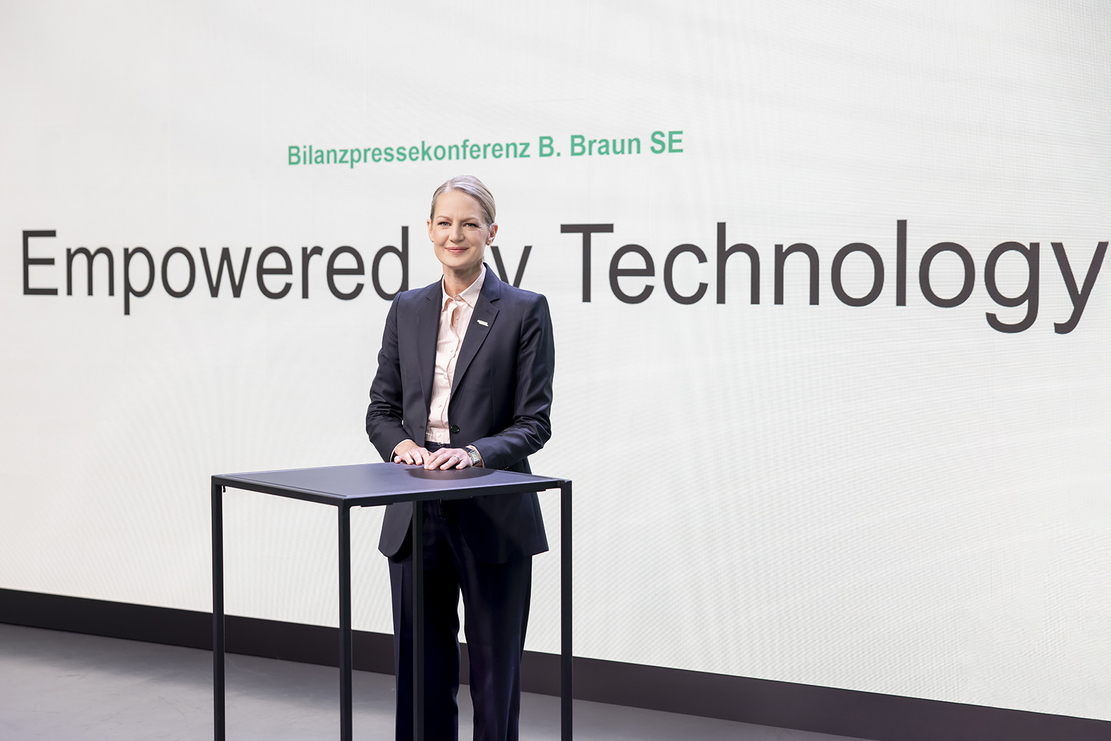 Anna Maria Braun presenting annual report conference titled empowered by technology